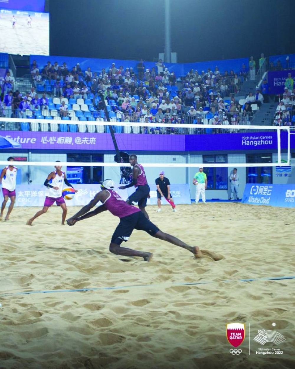 
Qatar’s beach volleyball pair Cherif Younousse and Ahmed Tijan in action during their match against Alnakran Abdilla and Jaron Requinton of the Philippines. 