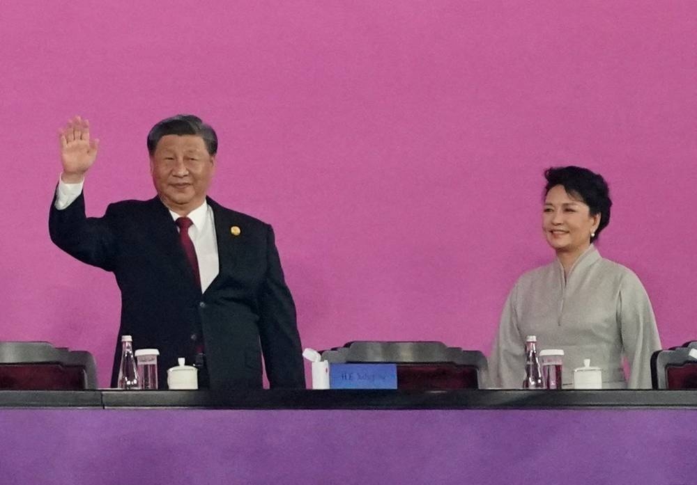 Chinese President Xi Jinping and his wife Peng Liyuan attend the Opening Ceremony. Reuters