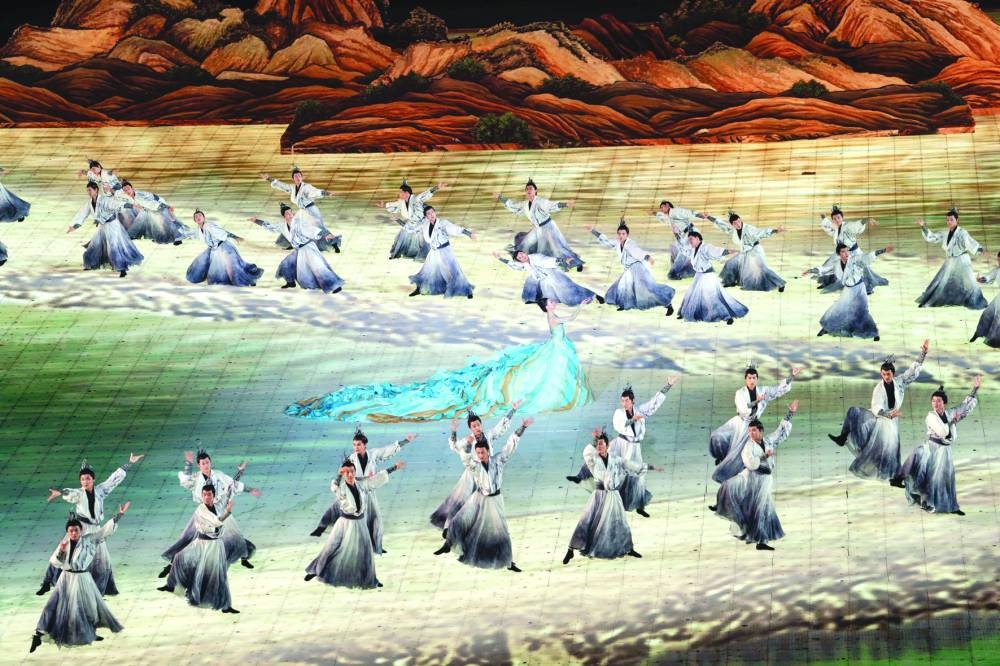 Performers take part in the opening ceremony of the 2022 Asian Games at the Hangzhou Olympic Sports Centre Stadium in Hangzhou in China's eastern Zhejiang province on Saturday. (AFP)