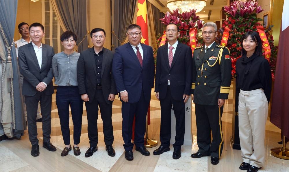 Chinese chargé d'affaires Chen Yue and embassy officials.