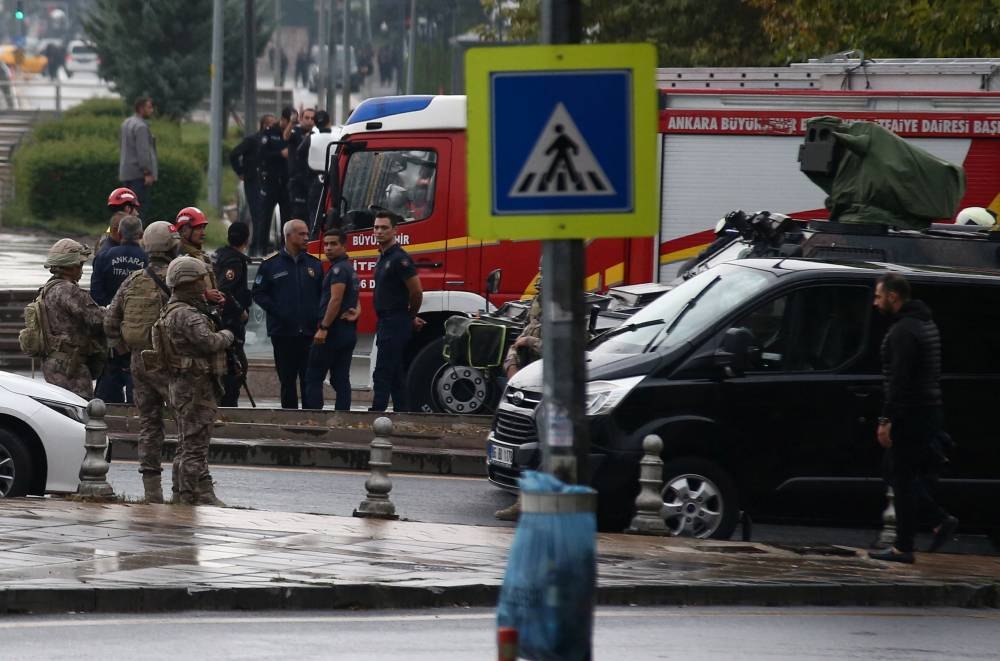 Members of Turkish Police Special Forces secure the area near the Interior Ministry following a bomb attack in Ankara, Turkiye, Sunday. REUTERS