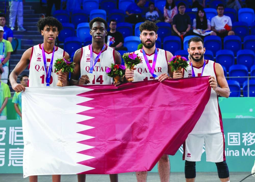 Qatar’s 3x3 basketball players celebrate after winning silver medal on Sunday.