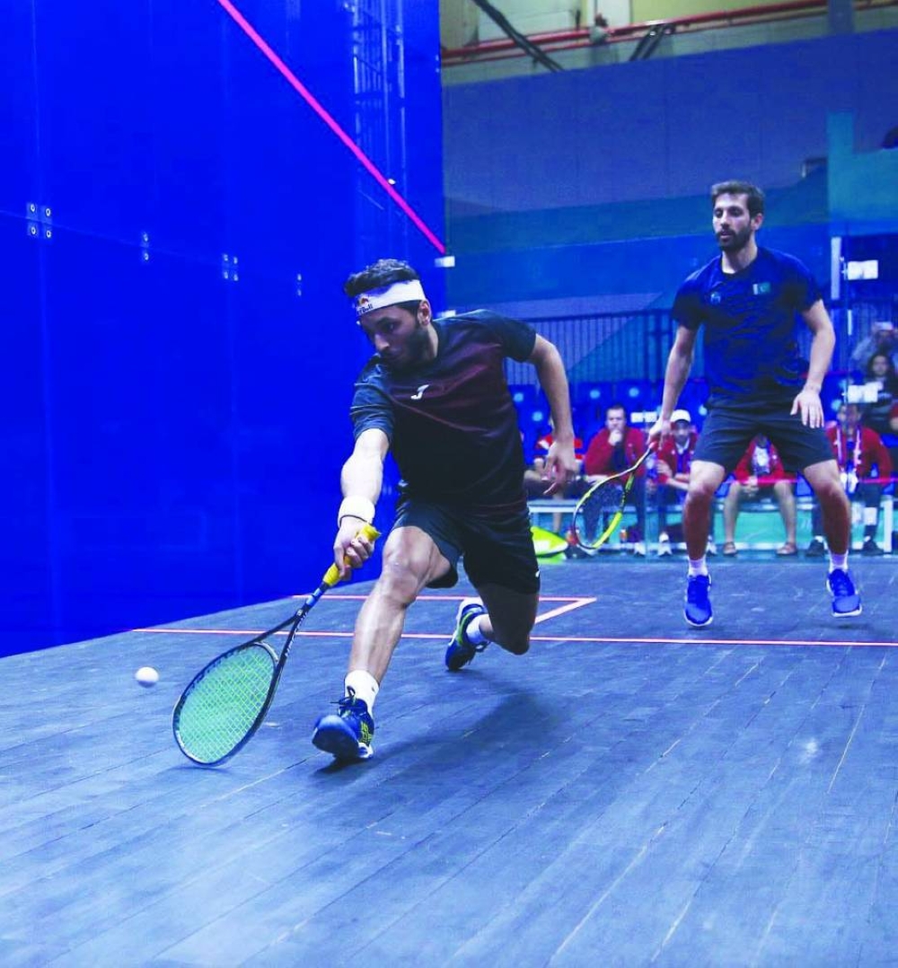 
Abdulla al-Tamimi (left) beat Pakistan’s Nasir Iqbal to enter the squash quarter-finals.  