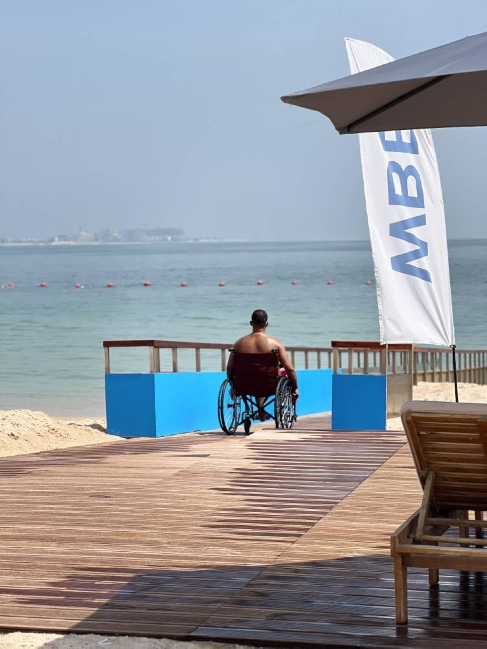 The ramp at WBB includes a structure that allows individuals using wheelchairs to navigate the sandy terrain and access the waterfront easily.