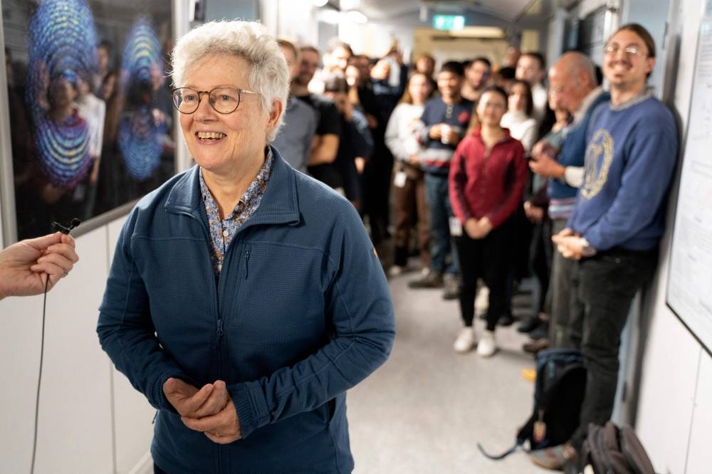French-Swedish physicist Anne L'Huillier, talks to journalists at Lund University, in Lund, Sweden after the Royal Swedish Academy of Sciences in Stockholm announced that she won the 2023 Nobel Prize in Physics. Ola TORKELSSON/TT News Agency/AFP