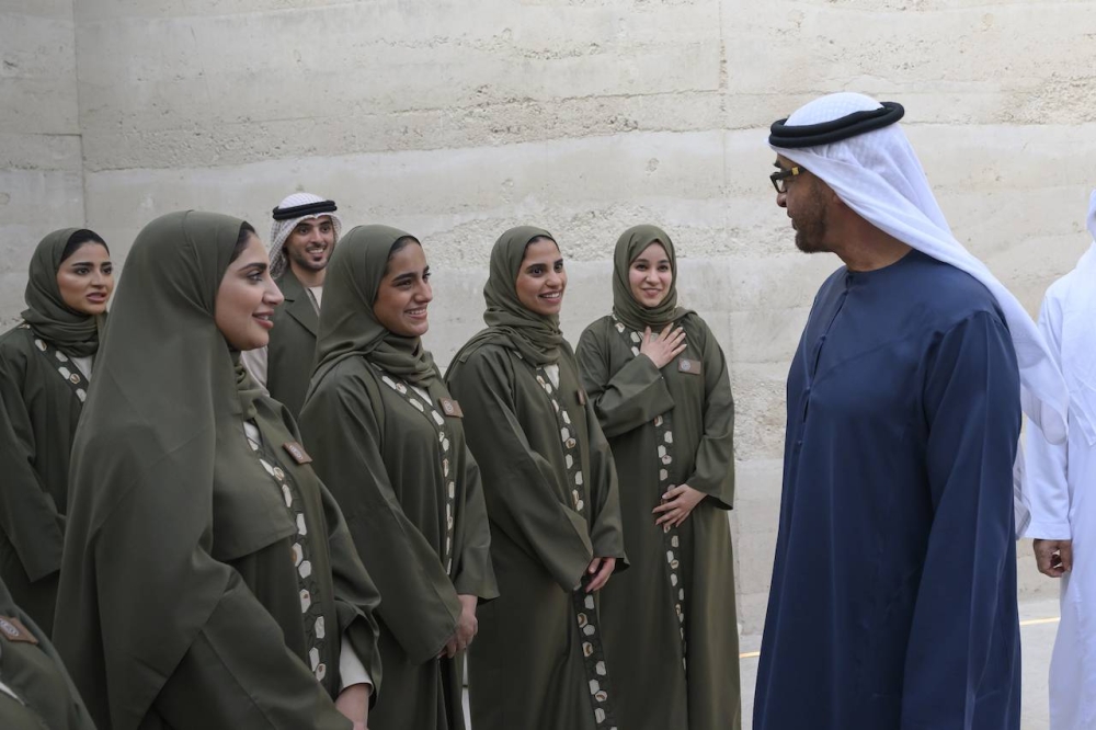 The UAE President Sheikh Mohamed bin Zayed al-Nahyan speaks with UAE representatives during a visit to the UAE pavilion at Expo 2023 Doha on Monday.