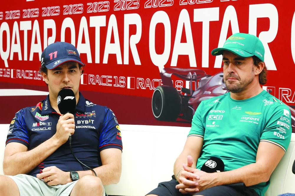 
Red Bull Racing’s Mexican driver Sergio Perez (left) Aston Martin’s Spanish driver Fernando Alonso attend a press conference at the Lusail Circuit, ahead of the Formula One Qatar Grand Prix. (AFP) 