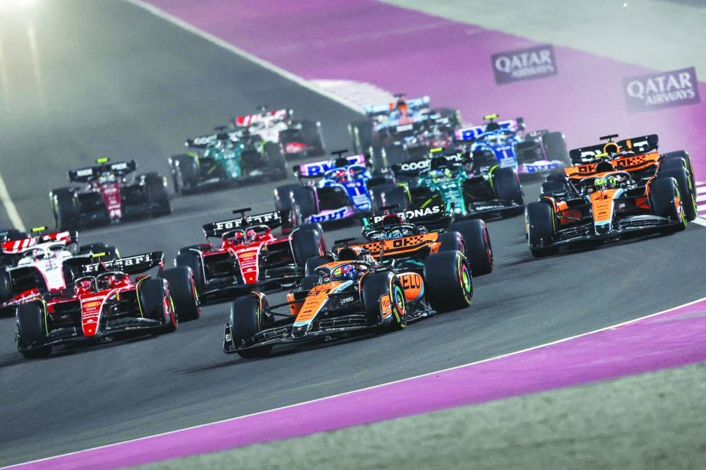 Drivers compete at the start of the sprint race at the Lusail International Circuit Saturday.