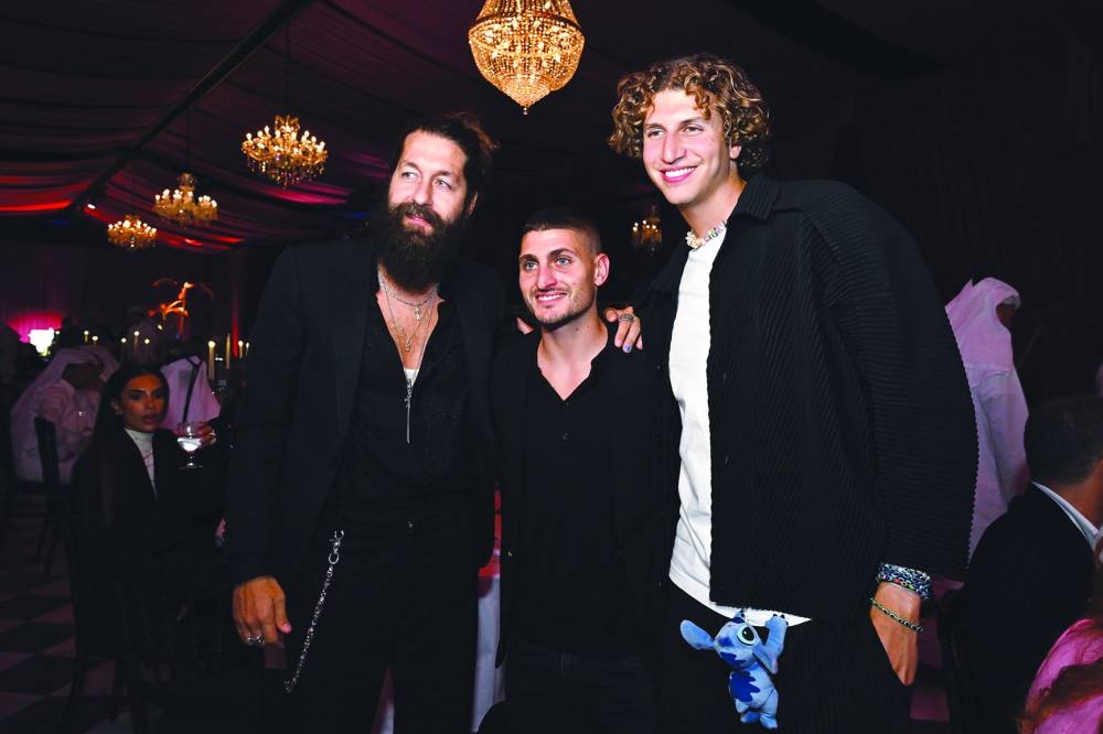 Marco Verratti (centre), Gstaad Guy (right) and a guest at the event.