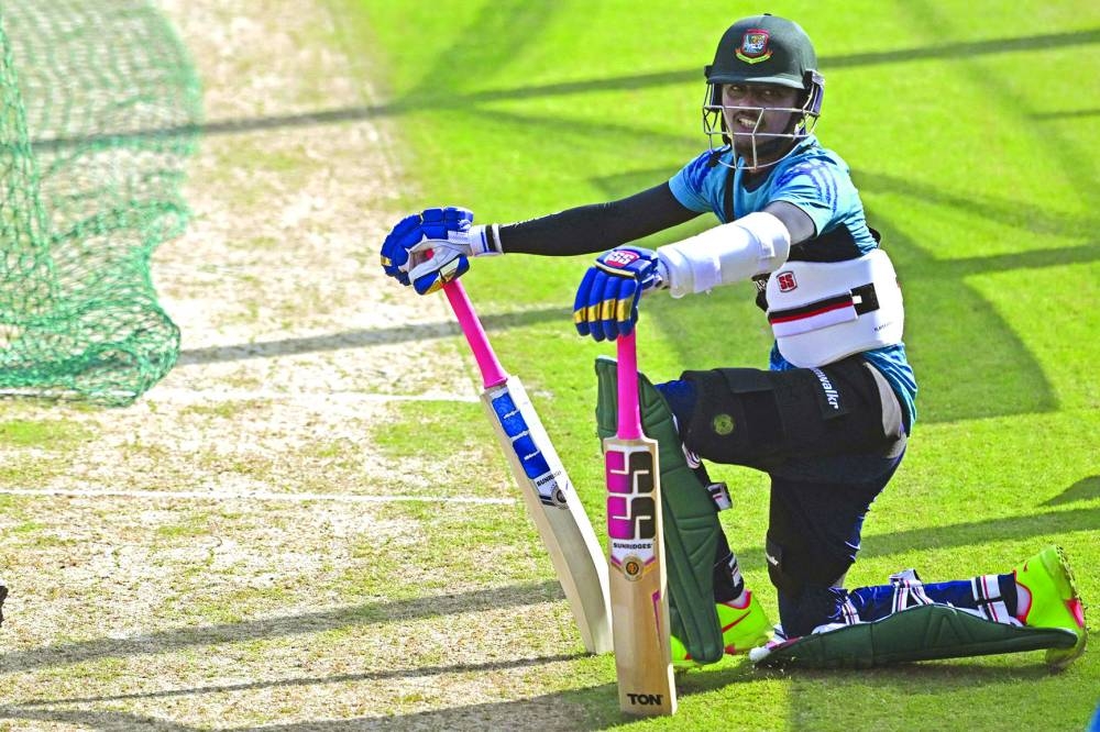 Bangladesh’s Mahedi Hasan waits to bat in nets during a practice session in Dharamsala on Monday. (AFP)