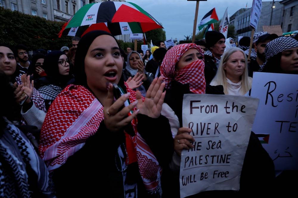 Demonstrators rally during a 'Stand with Palestine' protest in solidarity with Gaza, in Dublin, Ireland, Wednesday.