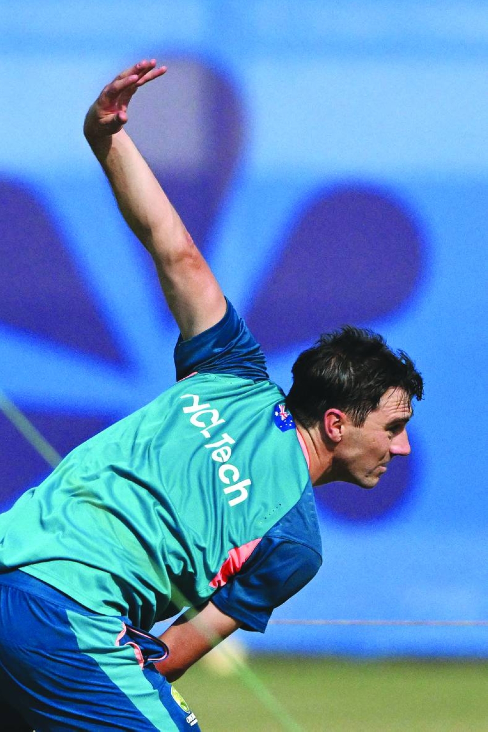 Australia’s Pat Cummins delivers a ball during a practice session at the Ekana Cricket Stadium in Lucknow on Wednesday. (AFP)