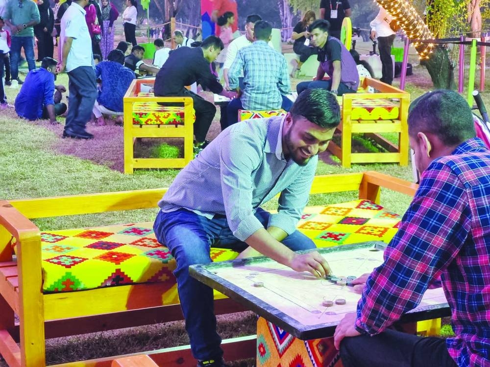 Visitors enjoying board games at Expo 2023 Doha Friday. PICTURE: Joey Aguilar