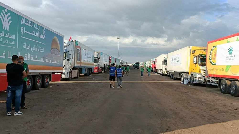 Trucks carrying humanitarian aid from Egyptian NGOs for Palestinians, wait for the reopening of the Rafah crossing at the Egyptian side, to enter Gaza, amid the ongoing conflict between Israel and the Palestinian Islamist group Hamas, in Rafah, Egypt Tuesday. REUTERS
