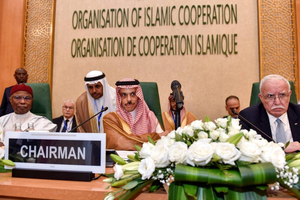 Saudi Arabia's Foreign Minister Prince Faisal bin Farhan (C) chairs an extraordinary meeting of the Organisation of Islamic Cooperation's (OIC) executive committee regarding the situation in the besieged Gaza Strip in Jeddah Wednesday. AFP