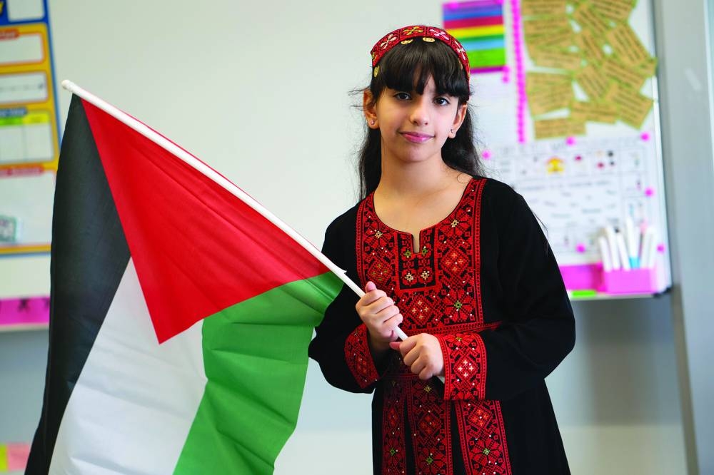 BACK PAGE PIC - Maryam Abdullah al-Khalifa, a 10-year-old student at QAM.