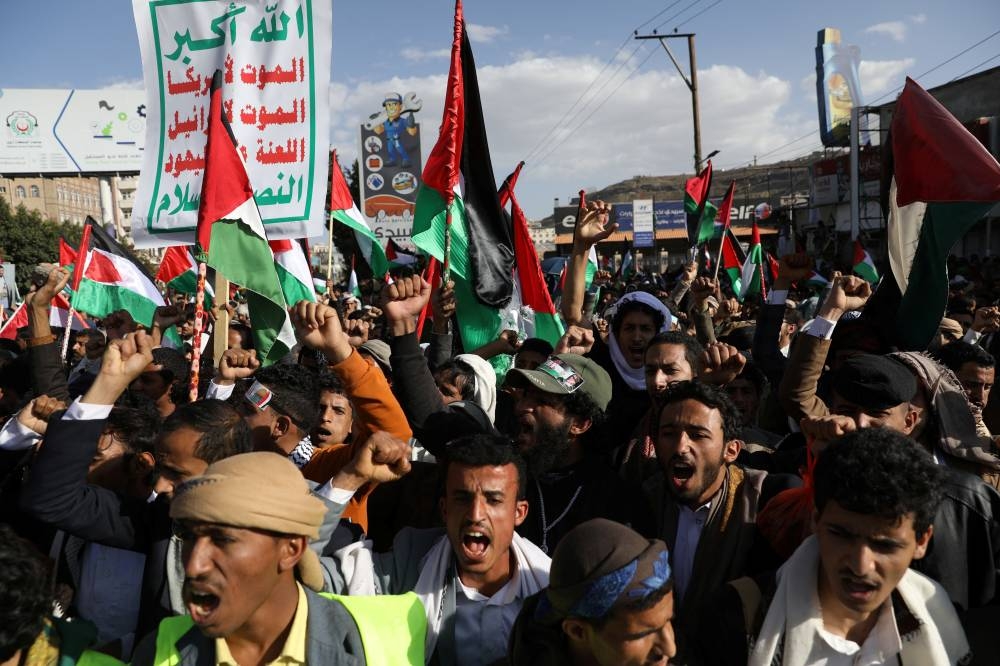 People protest in support of Palestinians in Gaza, as the conflict between Israel and Hamas continues, in Sanaa, Yemen Friday. REUTERS