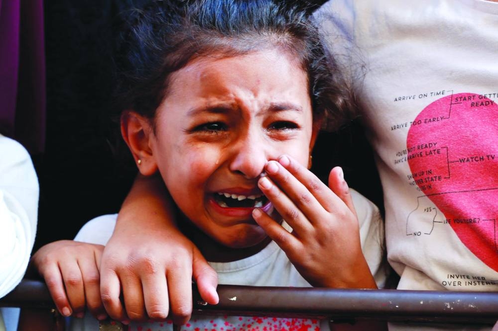 A child reacts during a funeral at Nour Shams camp in Tulkarm in the Israeli-occupied West Bank, on Friday.