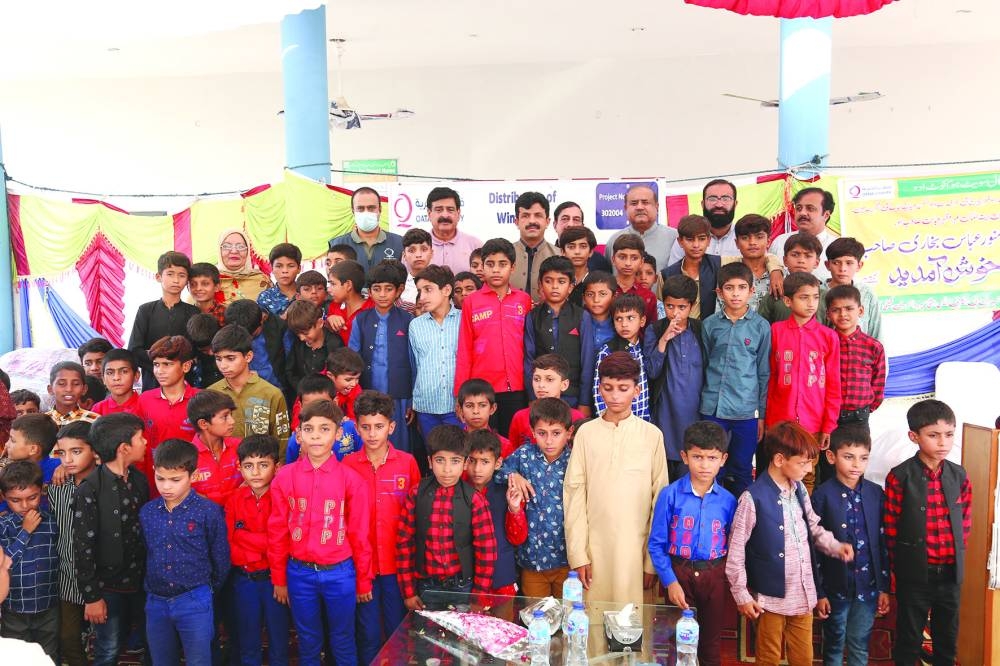 Some of the recipients of the winter bags.