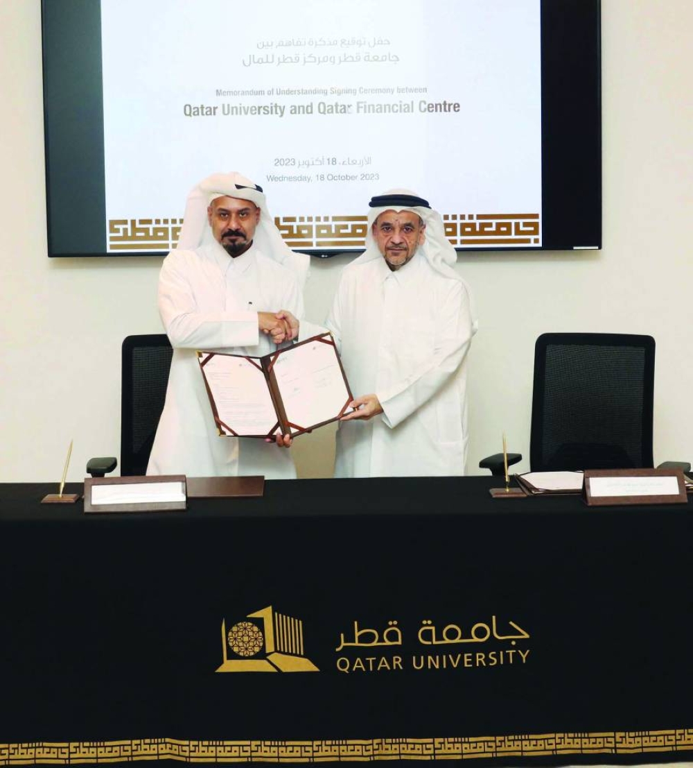 Dr Omar al-Ansari and Yousuf Mohamed al-Jaida sign the MoU setting the stage for a strategic partnership between QU and QFC that “promises to reshape the future of Qatar's innovation, entrepreneurship, and economic development.”