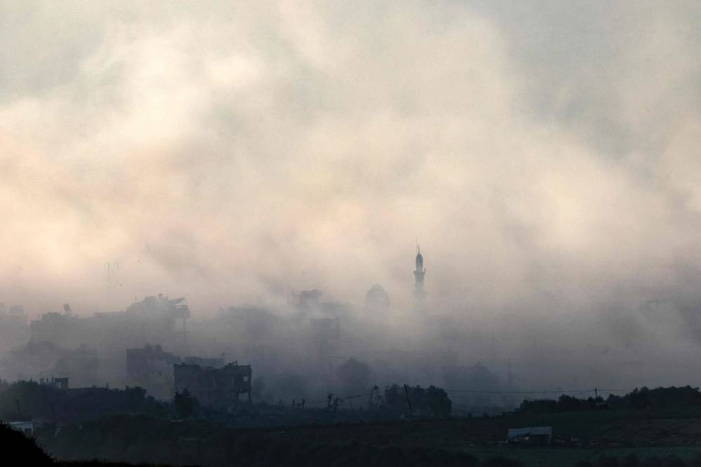 A picture taken from the southern Israeli city of Sderot on Wednesday shows smoke ascending over the northern Gaza Strip following an Israeli strike. AFP