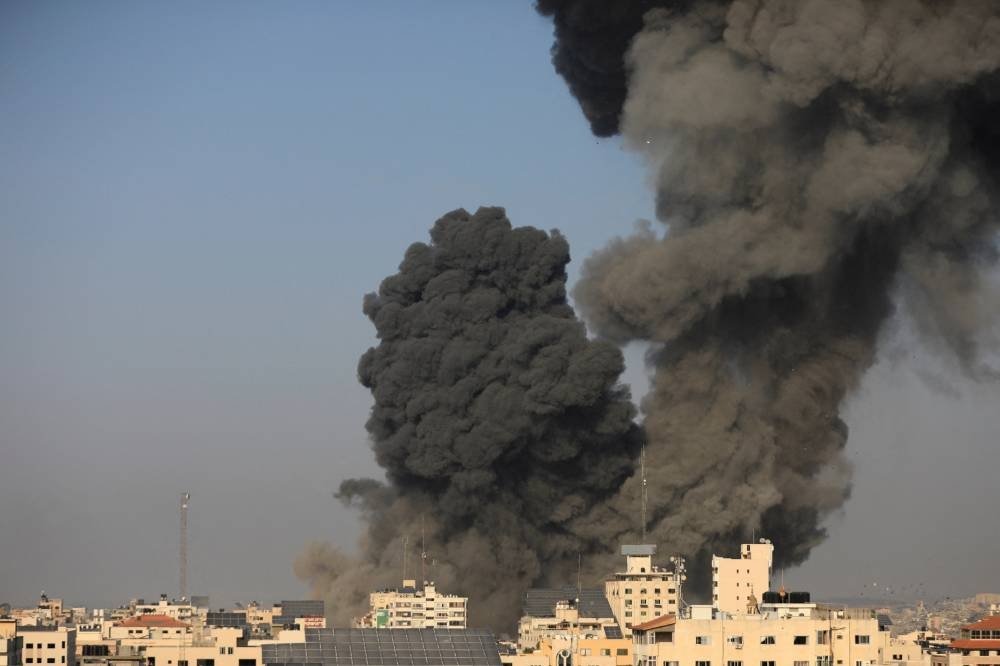 Smoke billows following an Israeli strike, in Gaza City, on Wednesday. REUTERS
