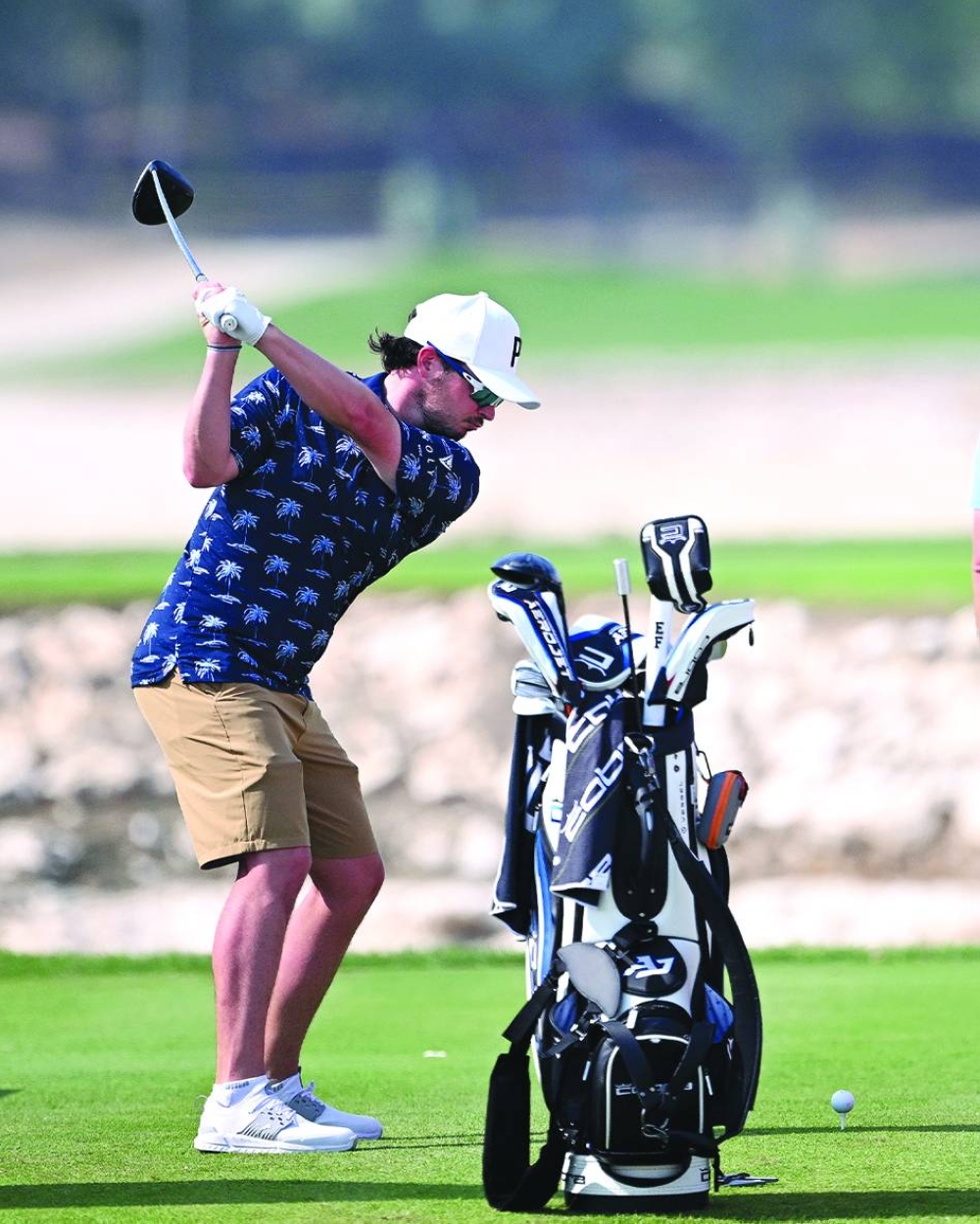 Defending champion Ewen Ferguson of Scotland practises at the Doha Golf Club on Wednesday, on the eve of the Commercial Bank Qatar Masters.