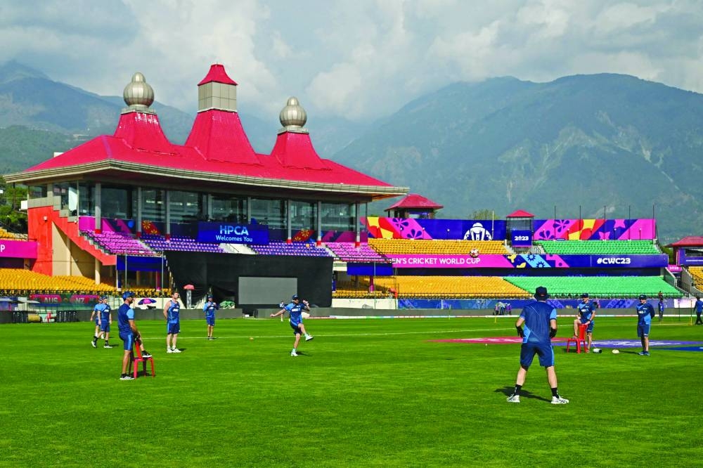 
New Zealand’s players attend a practice session on the eve of their 2023 ICC Men’s Cricket World Cup match against Australia at the Himachal Pradesh Cricket Association Stadium in Dharamsala. (AFP) 