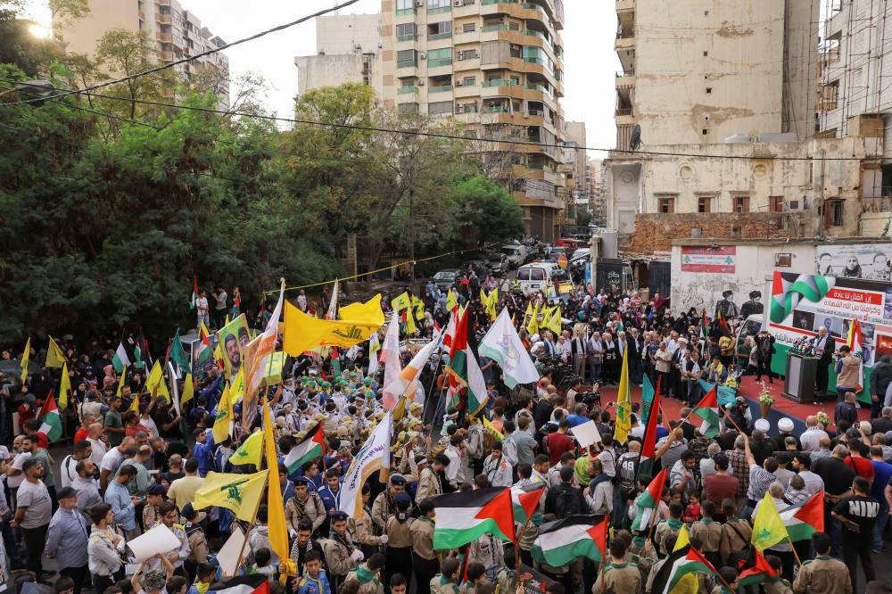 Hezbollah supporters protest in solidarity with Palestinians in Gaza in Beirut, Lebanon, Friday. REUTERS
