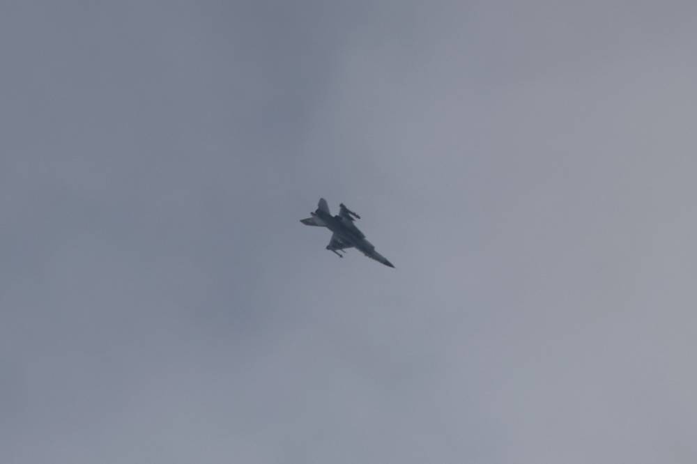 A picture taken from Israel's southern city of Sderot shows an Israeli jet fighter F-16 above the northern Gaza Strip, on Sunday. AFP