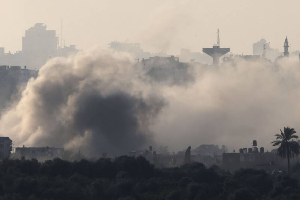 A picture taken from the Israeli side of the border with the Gaza Strip on Monday shows smoke billowing during Israeli bombardment in the north of the Gaza Strip. AFP