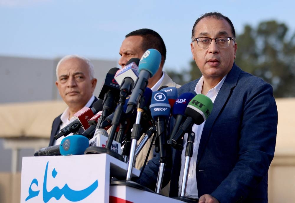 Egyptian Prime Minister Mostafa Madbouly speaks during his visit to the Rafah border crossing between Egypt and the Gaza Strip in Rafah, Egypt, Tuesday. REUTERS