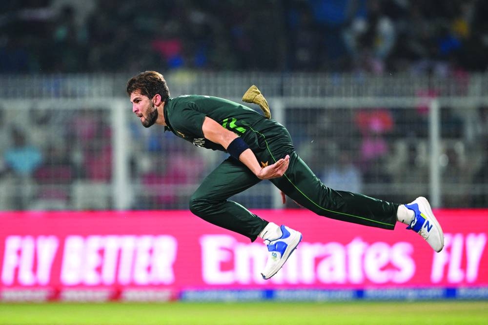 Pakistan’s fast bowler Shaheen Shah Afridi bowls during the 2023 Cricket World Cup match against Bangladesh at the Eden Gardens in Kolkata on Tuesday. (AFP)