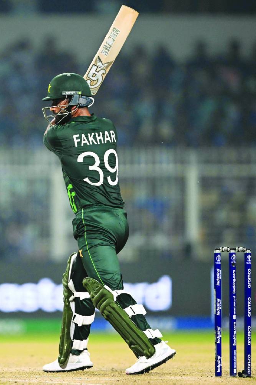 Fakhar Zaman watches the ball after playing a shot during the 2023 World Cup match against Bangladesh at the Eden Gardens in Kolkata on Tuesday. (AFP)