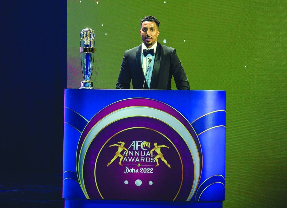 Saudi Arabia’s Salem al-Dawsari speaks after winning the AFC Player of the Year Award  at the Qatar National Convention Centre’s 
Al Mayassa Theatre on Tuesday.