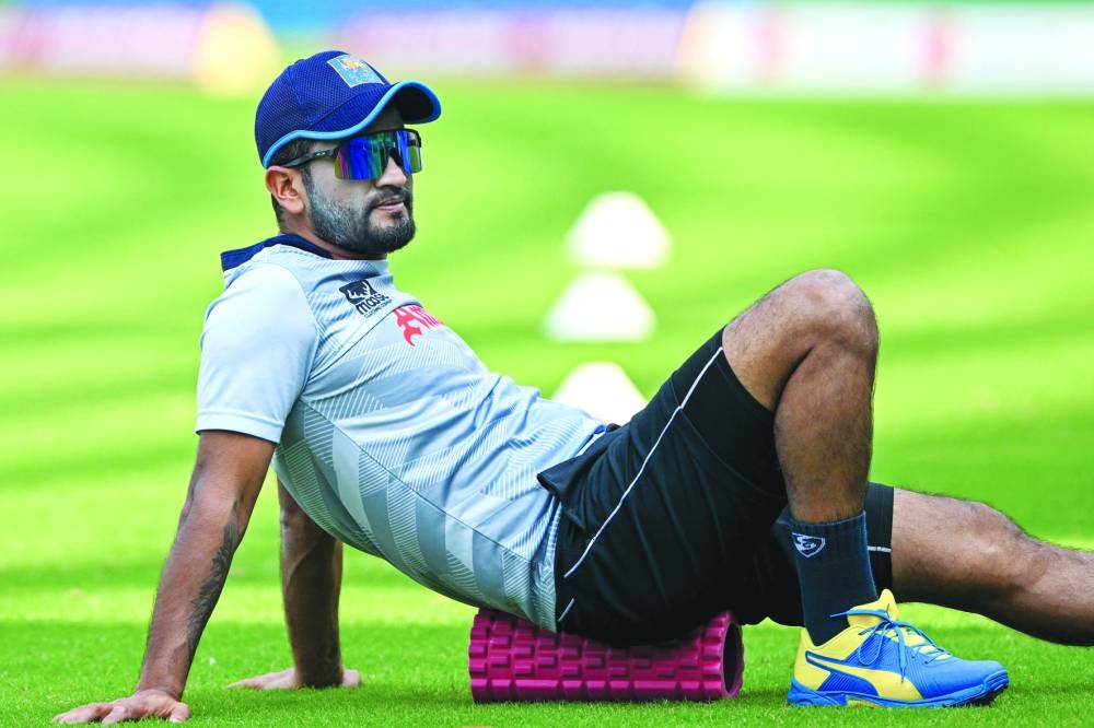 
Sri Lanka’s Dimuth Karunaratne attends a practice session on the eve of their ICC World Cup match against India in Mumbai. (AFP) 