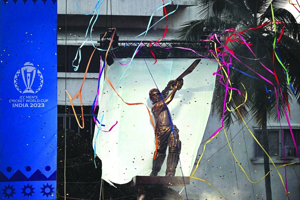 A grand statue of the former Indian cricketer Sachin Tendulkar is unveiled in his honour at the Wankhede Stadium in Mumbai on Wednesday. (AFP)