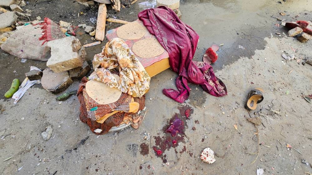 A view of bread dough lying near other food items on the ground, following a strike at a UN-run school sheltering displaced people, amid the ongoing conflict between Israel and Palestinian Islamist group Hamas, in the Jabalia refugee camp in the northern Gaza Strip on Saturday. REUTERS