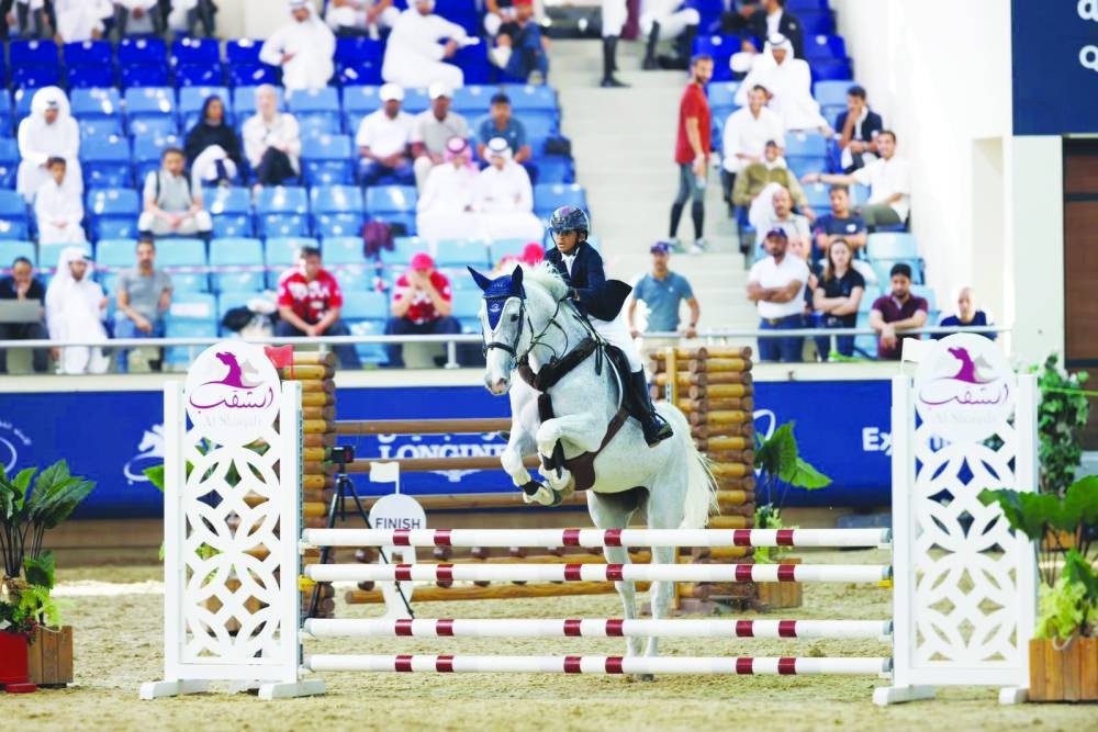 
Qatar Equestrian Federation President Bader bin Mohamed al-Darwish and Director of the Equestrian Education Department at Al Shaqab Mohamed bin Jaber al-Khayareen with the podium winners of the Amateur Class, Abdulla bin Tamim al-Thani, Mohamed Eisa al-Bukhari and Fahad bin Jassim al-Thani. 