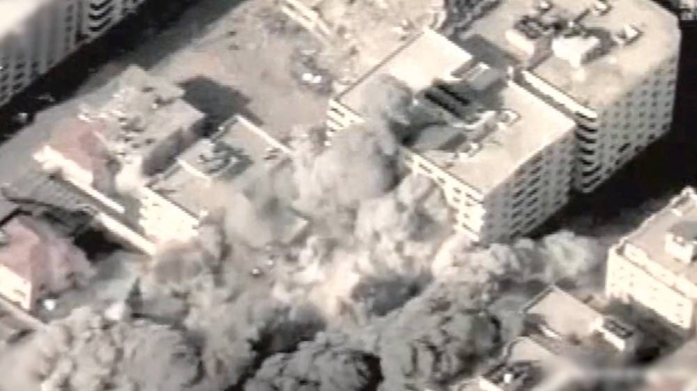 A view of military action at a location given as Gaza in this screengrab obtained from a handout video released on Monday. Israel Defense Forces/Handout via REUTERS   