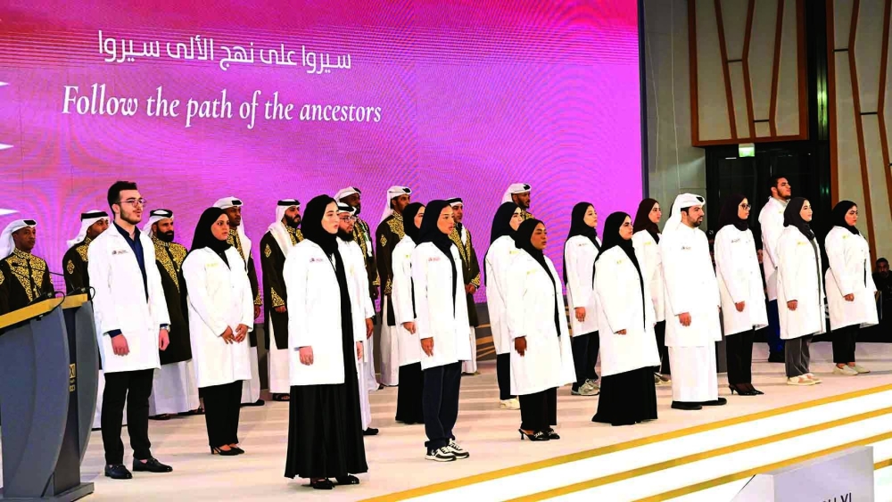 Students singing Qatar's national anthem at the event Tuesday. (Supplied picture)