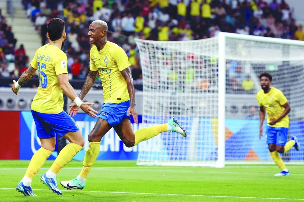 
Al Nassr’s Brazilian forward Anderson Talisca celebrates after scoring against Al Duhail during the AFC Champions League Group E at the Khalifa International Stadium in Doha. (AFP) 