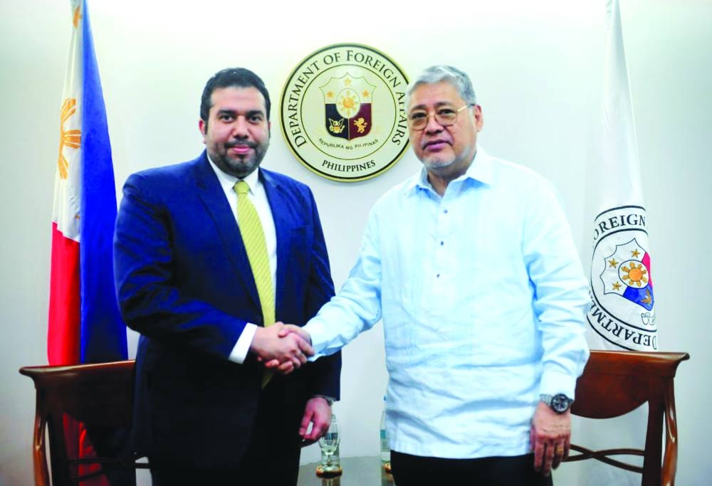 Philippine Secretary of Foreign Affairs Enrique Manalo meets with Qatar's ambassador in Manila Ahmed Saad al-Hamidi. 