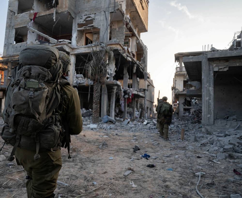 Israeli soldiers operate inside the Gaza Strip Saturday.