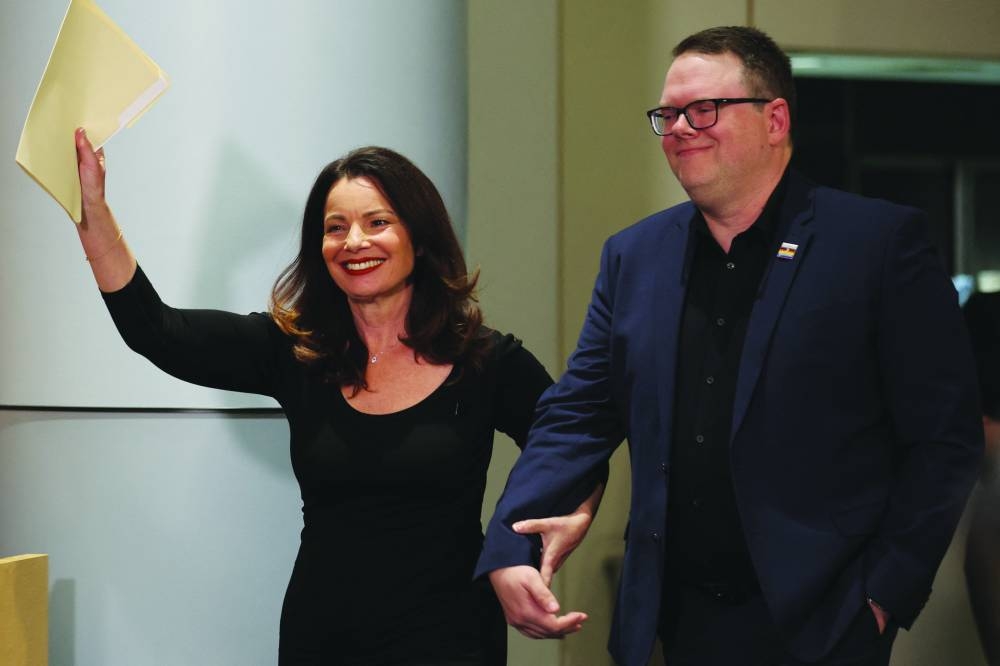 
SAG-AFTRA union President Fran Drescher and SAG-AFTRA chief negotiator Duncan Crabtree-Ireland attend a press conference after SAG-AFTRA TV/Theatrical Committee approved a tentative pact with the Alliance of Motion Picture and Television Producers to bring an end to the actors strike, in Los Angeles. (Reuters) 
