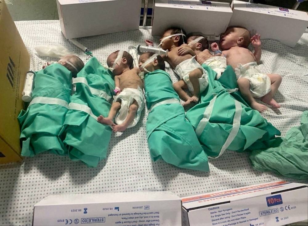 Newborns are placed in bed after being taken off incubators in Gaza's Al Shifa hospital after power outage in Gaza City, Gaza on Sunday in this still image obtained by REUTERS. 