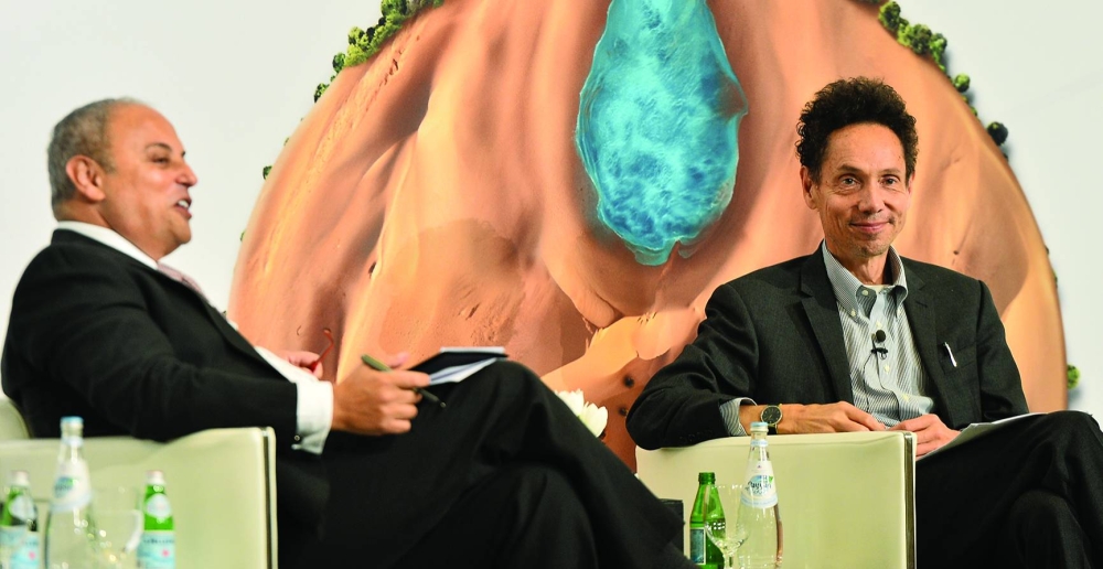 A panel discussion in progress at the conference. PICTURES: Shaji Kayamkulam Gladwell with GU-Q dean Dr Masri.