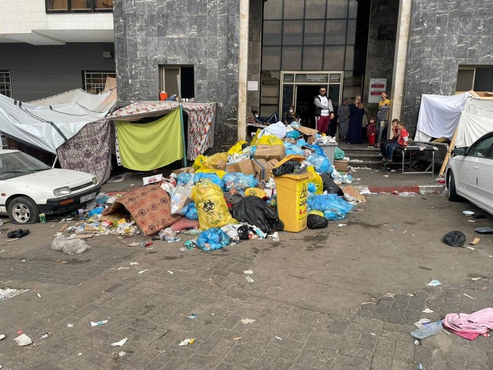 Trash piles up at Al Shifa hospital during the Israeli ground operation around the hospital, in Gaza City on November 12. Ahmed El Mokhallalati/via REUTERS
