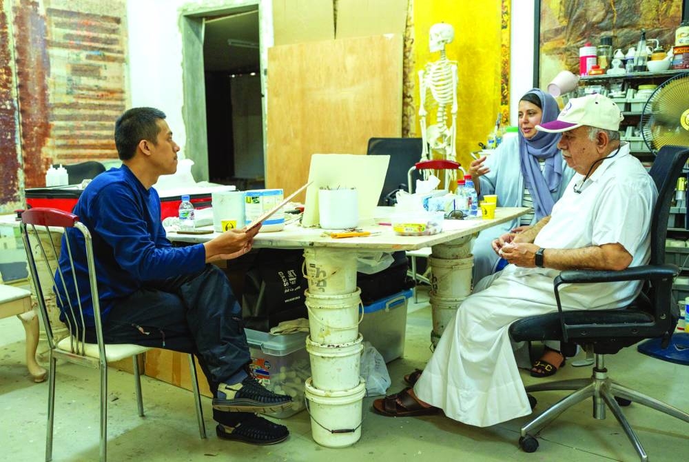 Widi, Dr Aisha, and Yousef.