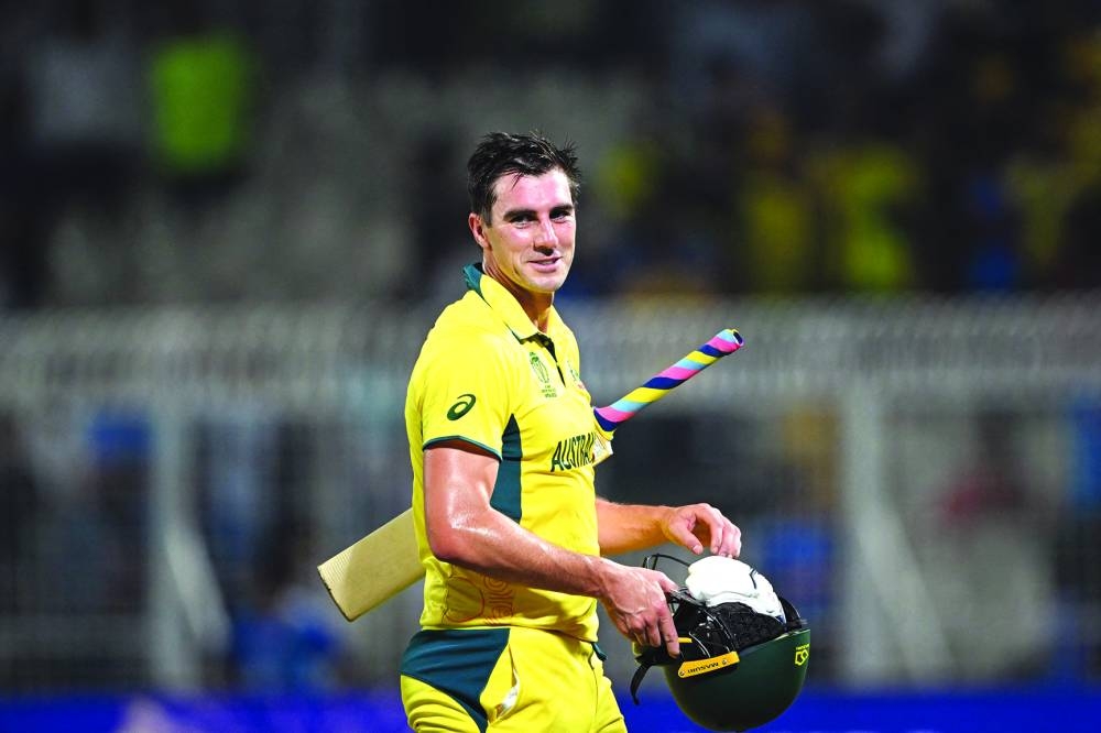 Australia's captain Pat Cummins celebrates his team's win at the end of the 2023 ICC World Cup semi-final against South Africa at the Eden Gardens in Kolkata on Thursday. (AFP) 